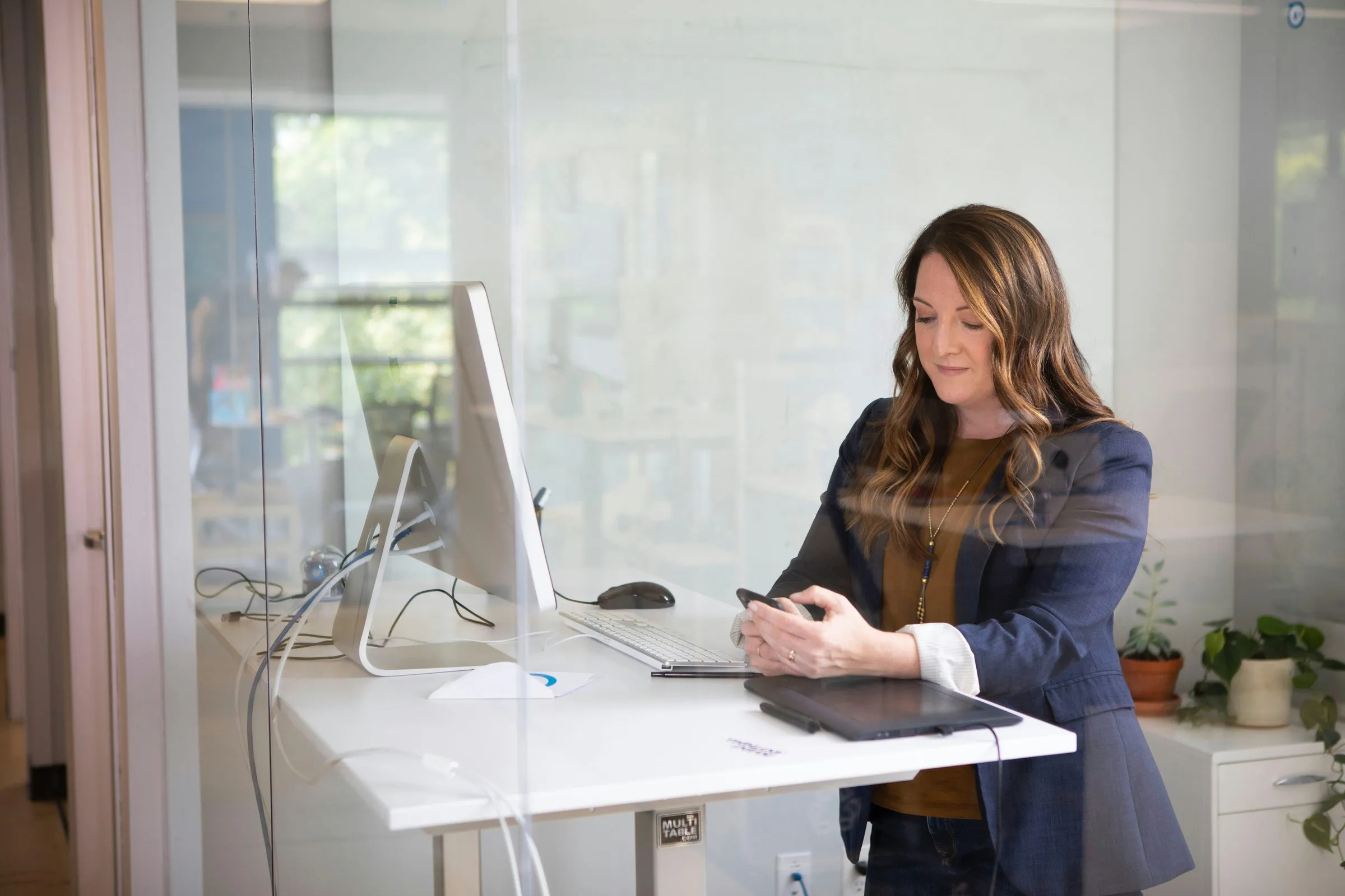 People using laptop and discusing